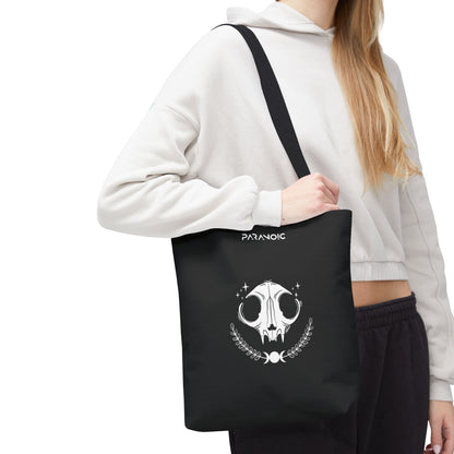 Model carrying the black Cat tote bag, cropped below the head